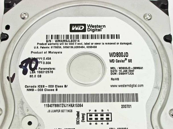 Western Digital WD800JD-08MSA1 drive label close-up showing model, serial number, LBA, date code, and jumper settings