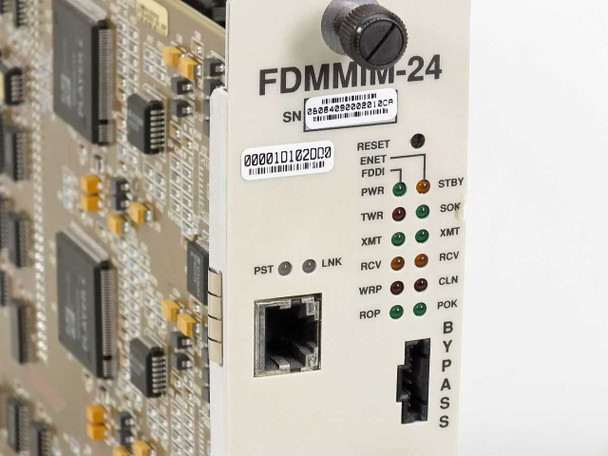 Cabletron FDMMIM-24 front panel mid-section – PST/LNK indicators, RJ-45 Ethernet port, BYPASS switch, and full LED array (XMT, RCV, WRP, ROP, SOK, CLN, POK)