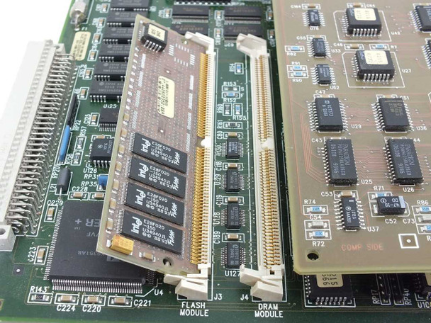 Cabletron FDMMIM-24 PCB interior – Flash Module (E28F020 ICs) and DRAM Module slot labeled on PCB, with surrounding logic ICs