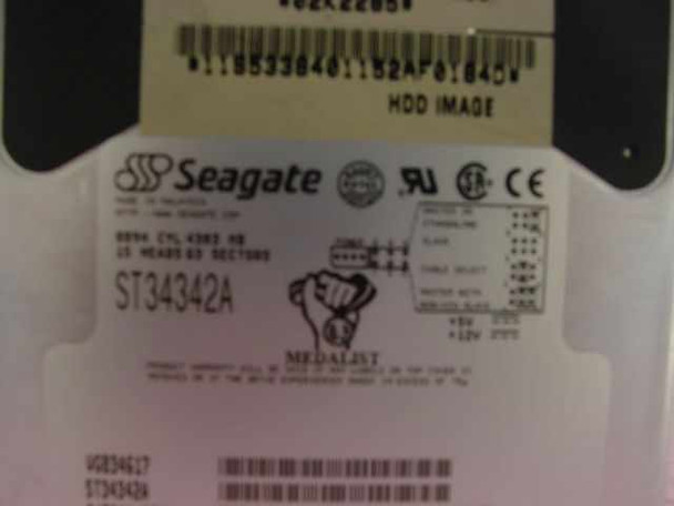Seagate ST34342A label close-up showing model, cylinders, heads, sectors, Medalist branding, and UL/CE markings