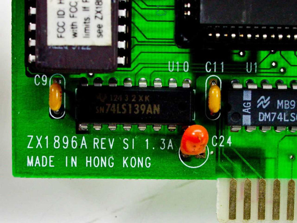 ZX1896A PCB close-up — board marking reads 'ZX1896A REV SI 1.3A MADE IN HONG KONG' with SN74LS139AN and MB9x series ICs visible