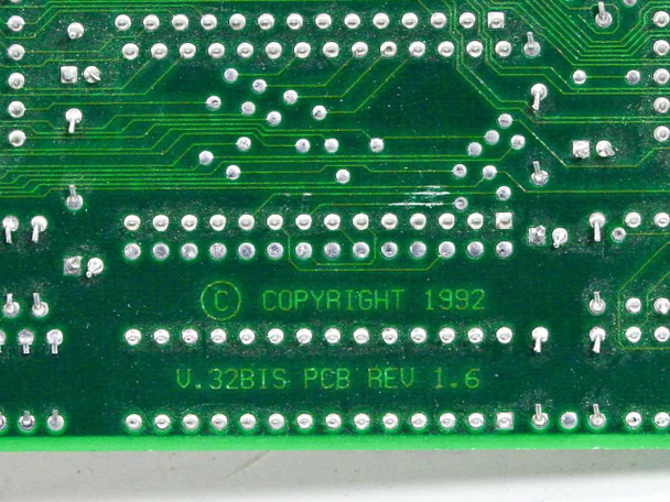 Zoom VFPV32BIS ISA modem card – close-up of PCB solder side showing copyright 1992 and V.32BIS PCB REV 1.6 markings