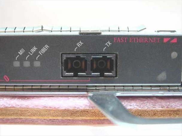 Cisco FEIP2-2FX faceplate close-up showing MII, LINK, FIBER LEDs and dual SC fiber RX/TX ports labeled FAST ETHERNET