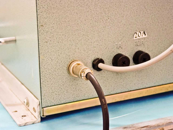 AIE AIE-605A1 rear panel showing 20A label and three cable connections including power cord
