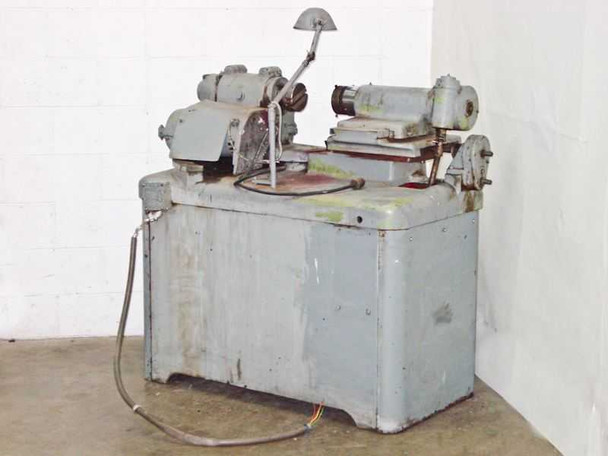 Autoflow Engineering 3173 — right-rear three-quarter view showing spindle head and cabinet base