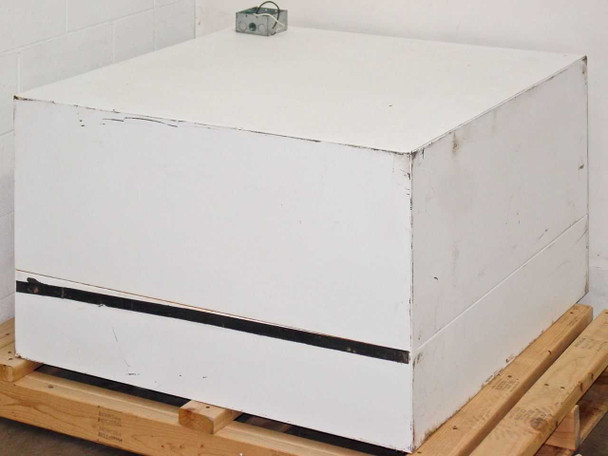 Vari-Speed laminar flow hood exterior rear/side view on pallet showing white painted cabinet, paint chips and wear on edges and corners