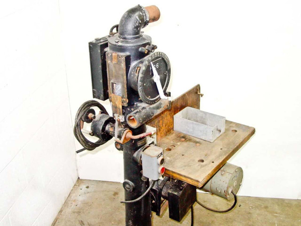Bell and Howell Model D film printer stand slightly angled view showing handwheel, column, work table, and printer head
