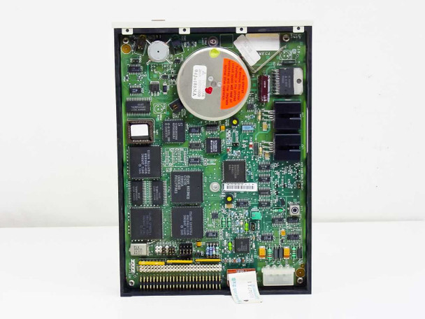 Iomega Beta 20CA – top-down internal view showing main PCB with controller ICs and optical disc motor assembly