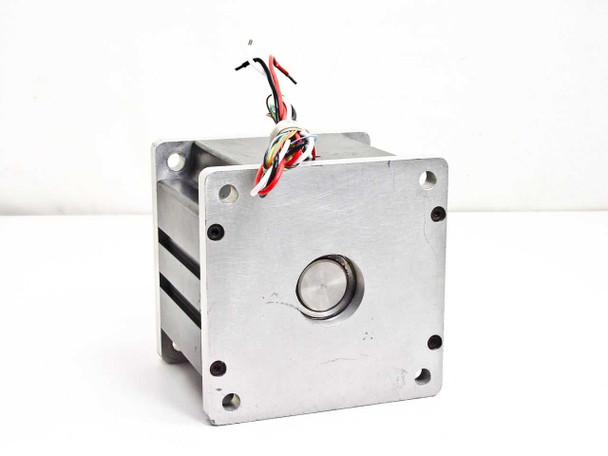 Emoteq QS05600 brushless servo motor rear face view showing circular shaft bore and corner mounting holes on aluminum frame