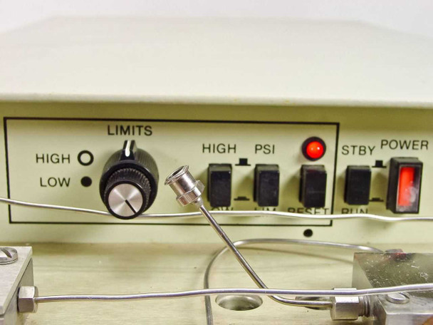 LDC ConstaMetric III G front panel upper section close-up showing LIMITS rotary dial, HIGH/LOW indicator lamps, HIGH PSI toggle, STBY illuminated, and POWER rocker switch