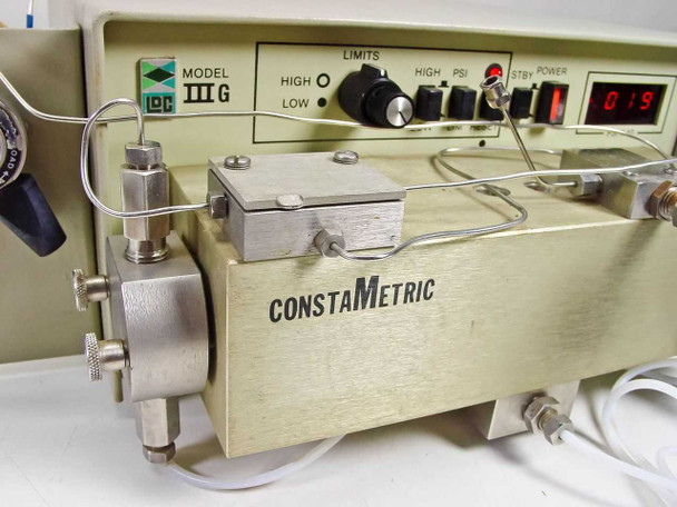 LDC ConstaMetric III G HPLC pump front panel close-up showing MODEL III G badge, LIMITS dial, HIGH/LOW indicators, PSI and POWER controls, and red LED display reading 019