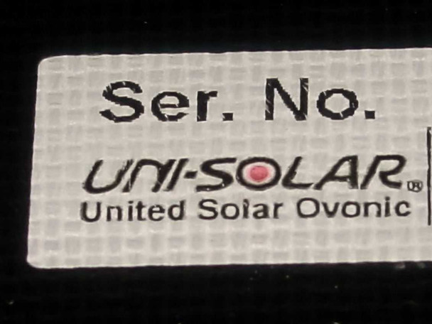 Uni-Solar United Solar Ovonic brand label on panel backing showing manufacturer name and serial number field