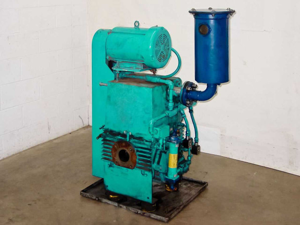 Kinney KTC112 vacuum pump right-side view — full unit on steel skid with blue oil mist eliminator to the right