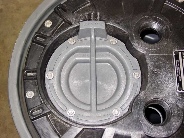 Top of Liberty Pumps P382LE41 basin showing central lid with two large knockouts and attached Liberty Pumps rating plate