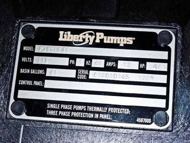 Liberty Pumps P382LE41 metal nameplate showing Model P382LE41, 115V, 1PH, 60Hz, 12A, 4/10 HP, 41-gallon basin, serial code B10010165, date 1209