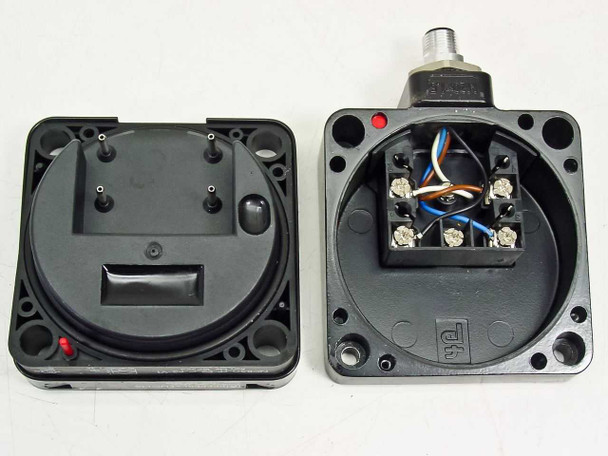 Pepperl+Fuchs NCB50-FP-E2-C-P3-V1 – disassembled view showing sensor housing interior with terminal block wiring and sensing disc