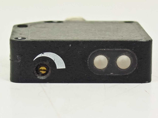 Banner QM42VP6LPQ photoelectric sensor — side view showing sensitivity adjustment potentiometer and dual optical lens apertures