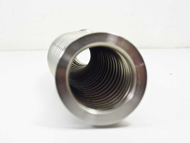 End-on view of DN40KF vacuum flex hose showing KF40 flange face and interior bore of the corrugated stainless steel bellows