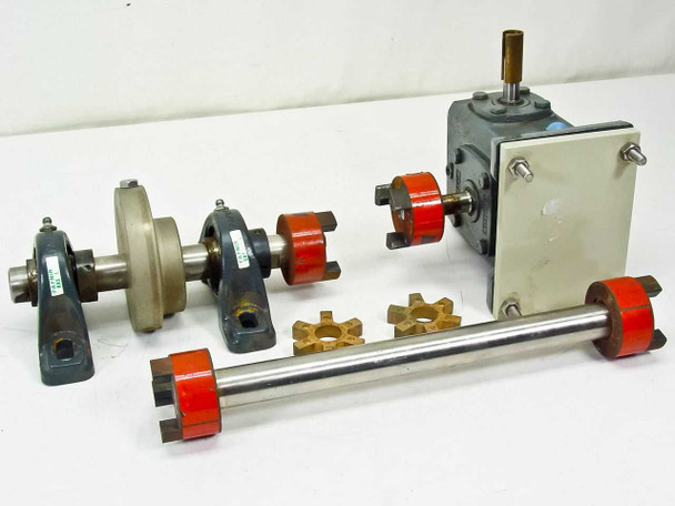 Boston Gear 713A-40J 700 Series indexing drive disassembled showing drive head, Lovejoy shaft assembly, spider couplings, and pillow blocks