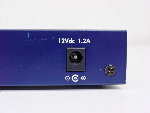 Netgear FS108 rear panel close-up showing 12Vdc 1.2A power input barrel jack