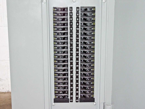 Square D NQOD sub panel interior — full array of 42 numbered single-pole branch circuit breakers, circuits 1–42