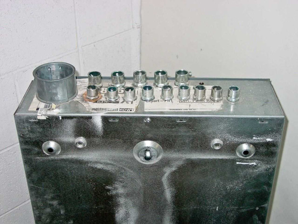 Top of Square D Type 1 panelboard enclosure showing multiple conduit knockouts and wire entry points