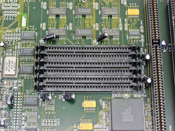 Epson 723-MA motherboard close-up of additional 30-pin SIMM slots with Toshiba ICs and support logic chips