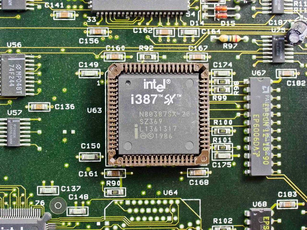Intel i387SX math coprocessor chip close-up on Epson 723-MA board showing markings N80387SX-20 SZ369 and 1986 date code