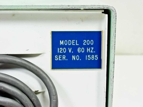 Mattson-Garvin Model 200 close-up of blue identification label reading MODEL 200, 120V 60 HZ, SER. NO. 1585