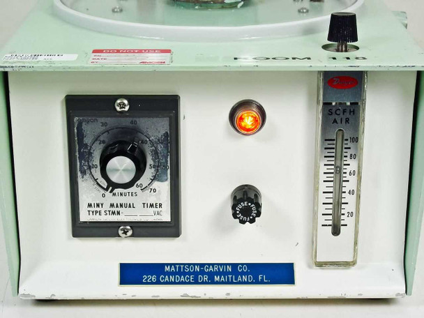 Mattson-Garvin Model 200 front panel close-up — Minuty manual timer dial, lighted orange On indicator, flow rate knob, and SCFH air rotameter; Mattson-Garvin Co. nameplate visible