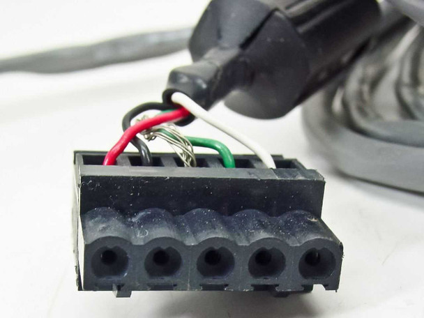 Close-up of PGT PRISM60 control cable multi-pin connector end showing red, green, white, and bare wire terminations