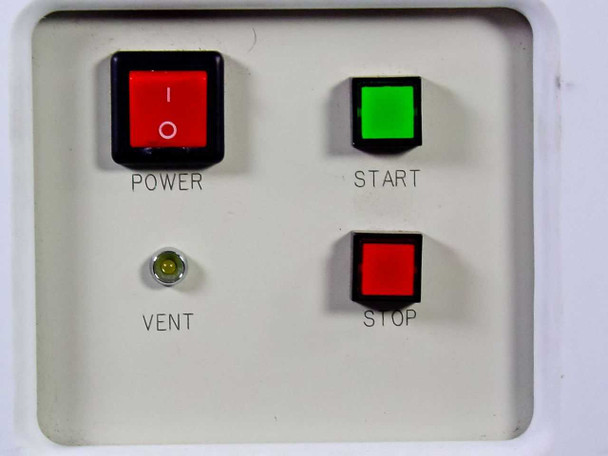 Close-up of front control panel showing POWER rocker switch, green START button, red STOP button, and VENT indicator