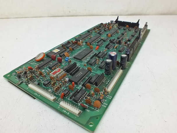 Sharp N0483FC-1 I/O Card — angled top view showing component side with DIP ICs, capacitors, and CN-E connector header