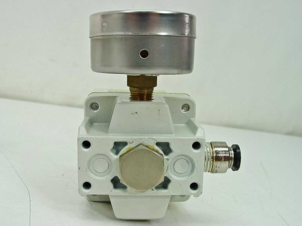 SMC IR2020-02BG Precision Regulator bottom/port view showing supply inlet hex fitting and push-in connector