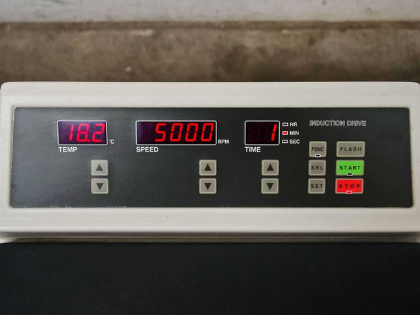 Tomy MRX-152 front control panel – digital displays showing TEMP 18.2°C, SPEED 5000 RPM, TIME 1 MIN; induction drive controls