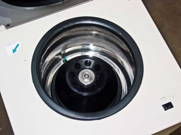 Tomy MX-160 centrifuge chamber open showing stainless steel bowl with installed TMX-20 rotor and rubber gasket lid seal