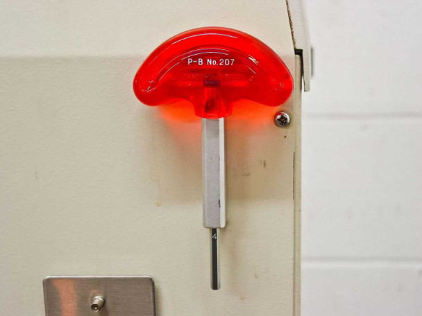 Tomy MRX-151 rotor key detail — red P-B No.207 key attached to side panel