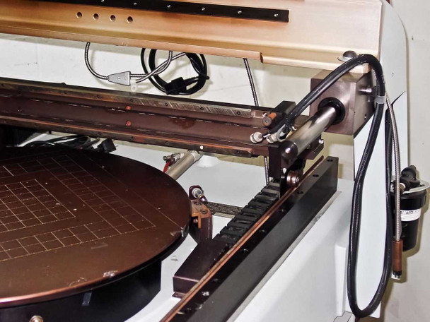 Villa Precision GS-210 scribing arm and head assembly overhead view showing full linear travel range over vacuum chuck stage with flex cable chain
