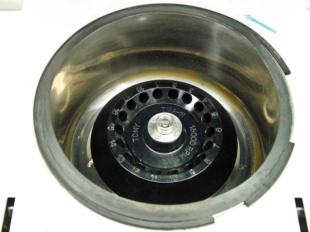 Tomy TMA-11 18-slot rotor inside MCX-151 centrifuge chamber – top-down view showing all 18 vial slots and worn lid seal gasket