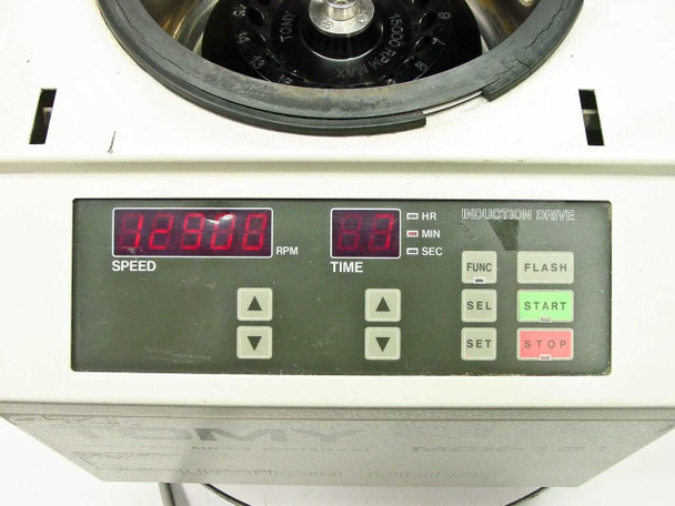 Tomy MCX-151 digital control panel close-up – LED speed display reading 02908 RPM, digital timer display, and FUNC/SEL/SET/FLASH/START/STOP buttons