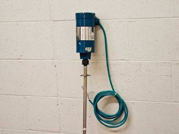 MTS Level Plus A910410172 transmitter head close-up — blue NEMA 4 housing, hex conduit entry, teal cable connection, stainless steel rod below