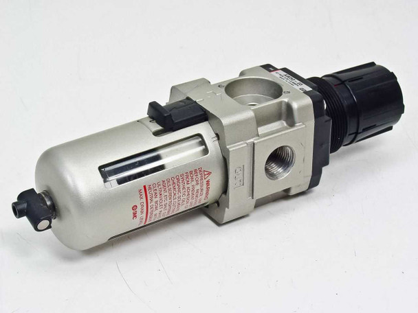 SMC AW30-03KR direct operated filter regulator – right-side three-quarter view showing bowl, regulator knob, and warning label