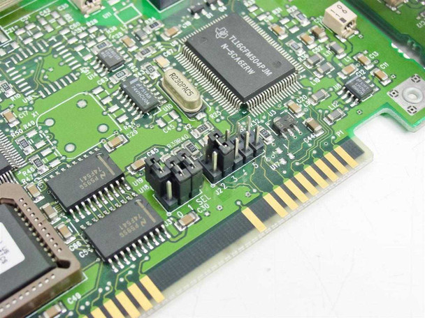 US Robotics Sportster ISA modem – close-up of jumper block and TL16C754 UART chip on PCB