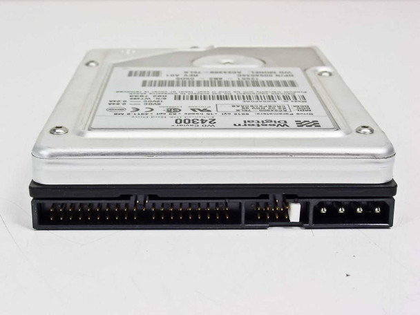 Western Digital AC24300 4.3GB 3.5-inch IDE hard drive – front edge view showing 40-pin IDE data connector and 4-pin power connector
