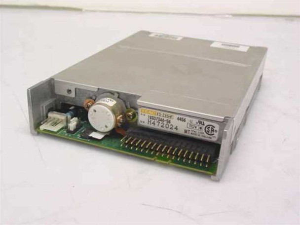 Compaq 141350-001 floppy drive – bottom/side view showing TEAC FD-235HF label, 34-pin IDC connector, and internal PCB