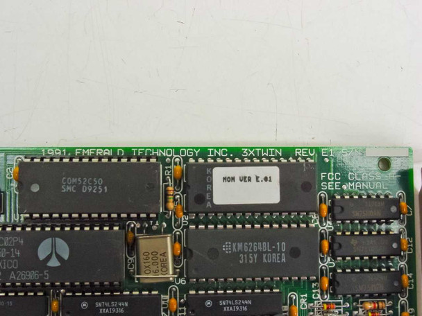 Emerald Technology 3XTWIN Rev E1 PCB close-up – silkscreen reads '1991 Emerald Technology Inc. 3XTWIN REV E1' with COM52C50 and KM62648L-10 chips visible