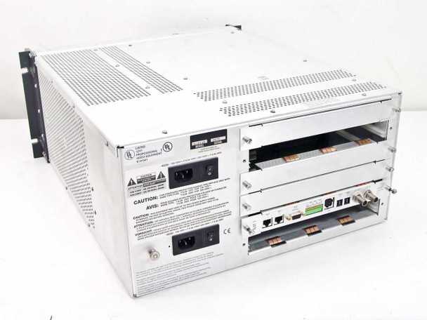 Scientific Atlanta D-9130 rear panel view showing dual IEC AC inlets, CE mark, and installed modules