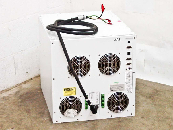 Dynatronix PMC 351/6-10-20XR — rear view showing four large cooling fans, green terminal blocks, caution label, and power cable exit