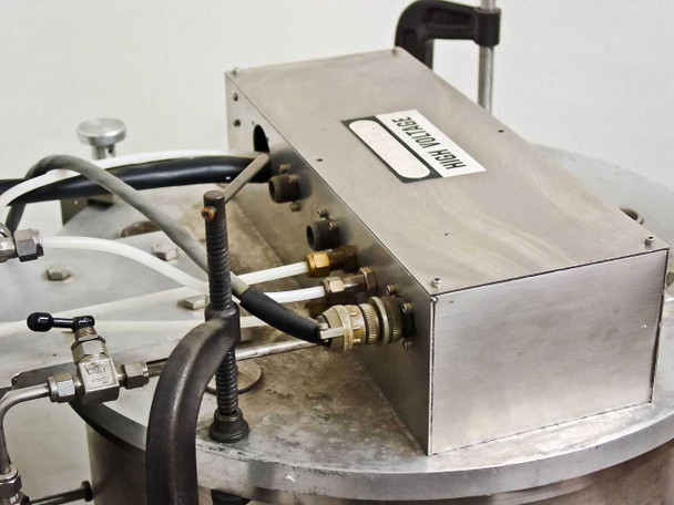 Top-mounted stainless steel gas distribution manifold labeled 'High Ion' with multiple gas/water tube connections and valves