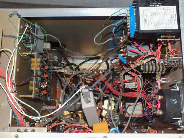 LFE PFS/PCrE/PDS-501 — interior electronics compartment showing dense wiring, multiple circuit boards, transformers, solenoid components, and a blue switching power supply module